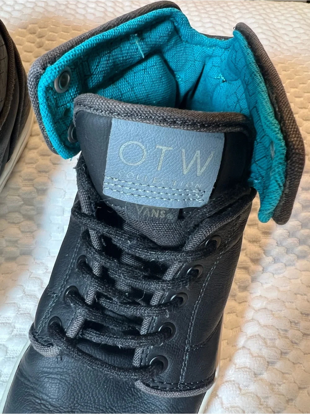 Vans Black High-Top Sneakers with Teal Lining